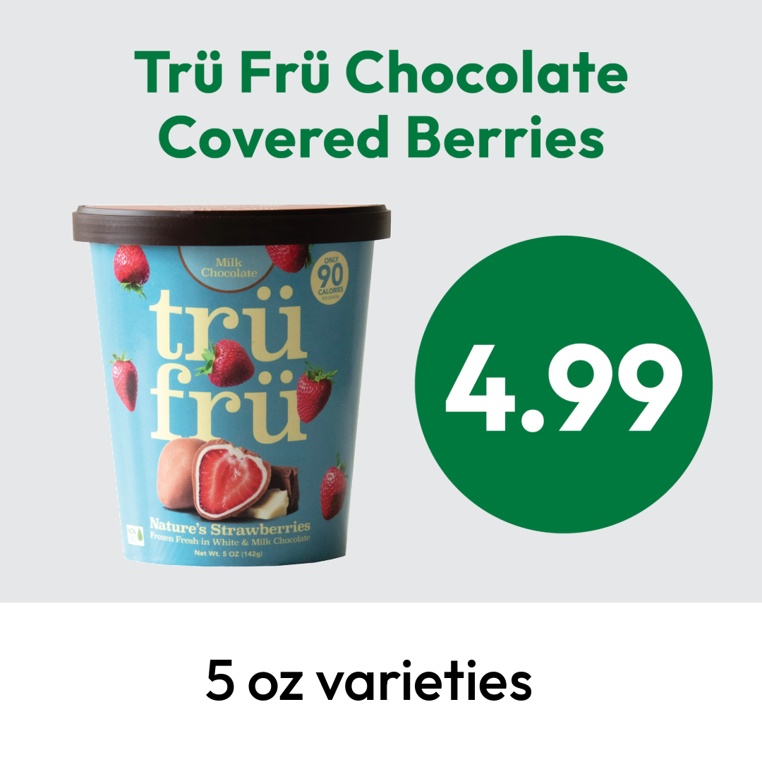A container of Trü Frü chocolate covered berries is shown with a price of $4.99 and the text 5 oz varieties. The container is blue with images of strawberries and chocolate pieces.