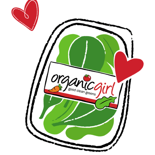 Illustration of an organicgirl salad greens container filled with organic greens, two red hearts, and a label that reads "organicgirl good clean greens," decorated with a tomato, carrot, and lettuce.