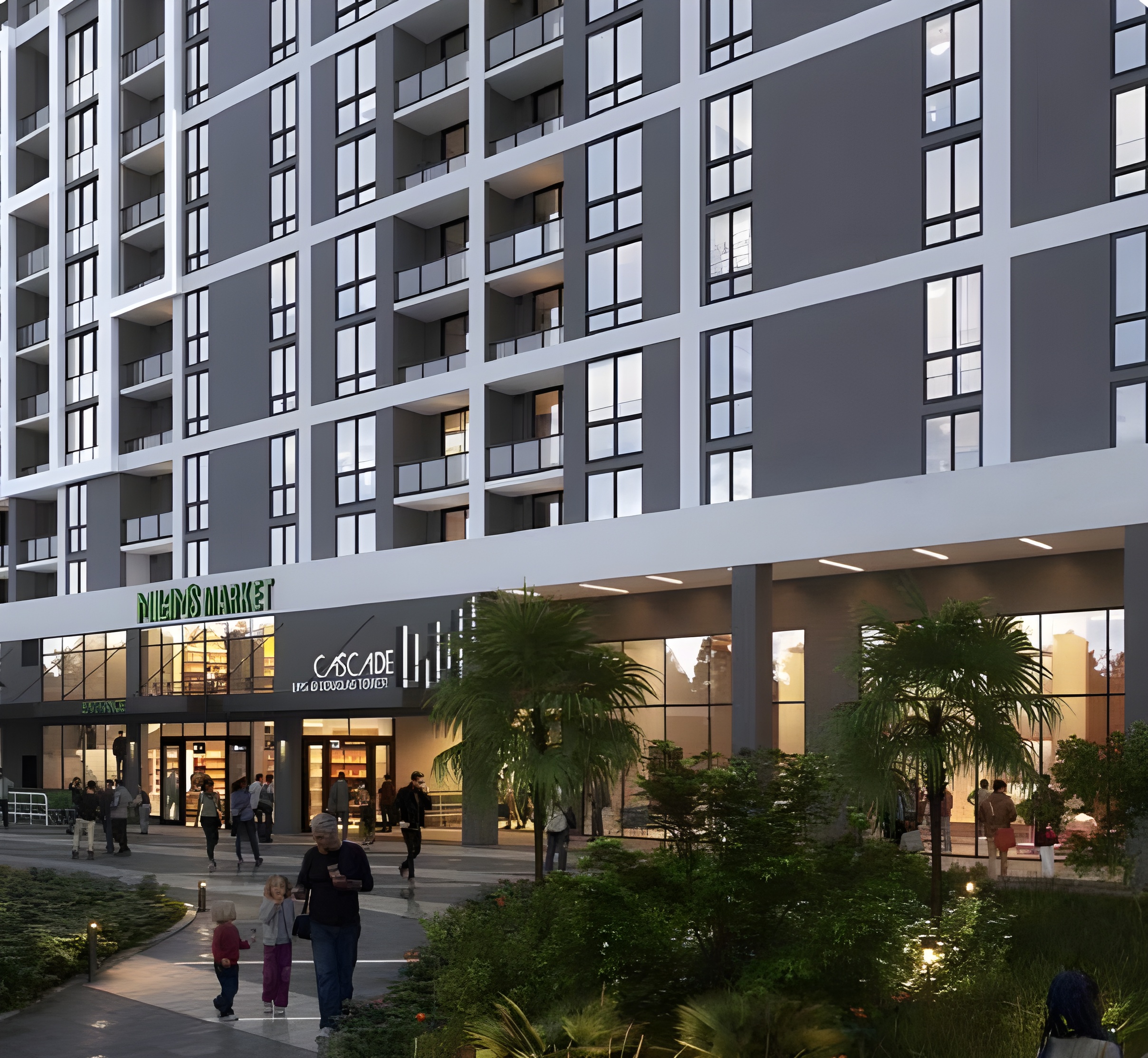 A modern multi-story apartment building with ground-floor shops, including a grocery market, a wellness center, and a Seafood Showcase. People walk along a landscaped plaza with greenery and palm trees in front of the building.